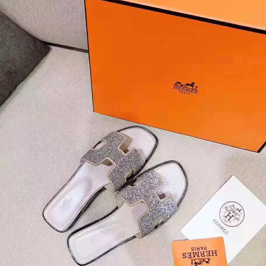 Hermes Oran Sandal Hermes Sandal in Metallic Nappa Leather and Cristal Powder for Women in Sandy