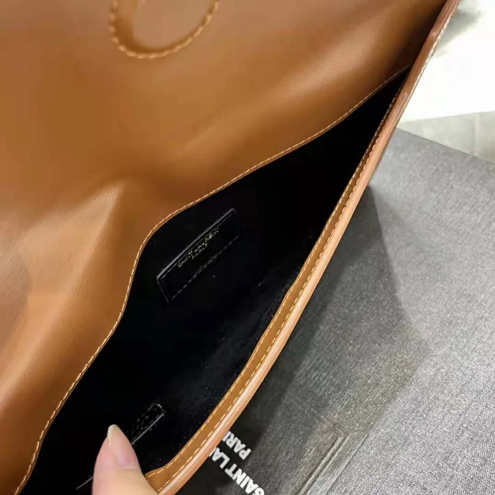 Saint Laurent YSL Uptown Pouch in Canvas and Smooth Leather for Women