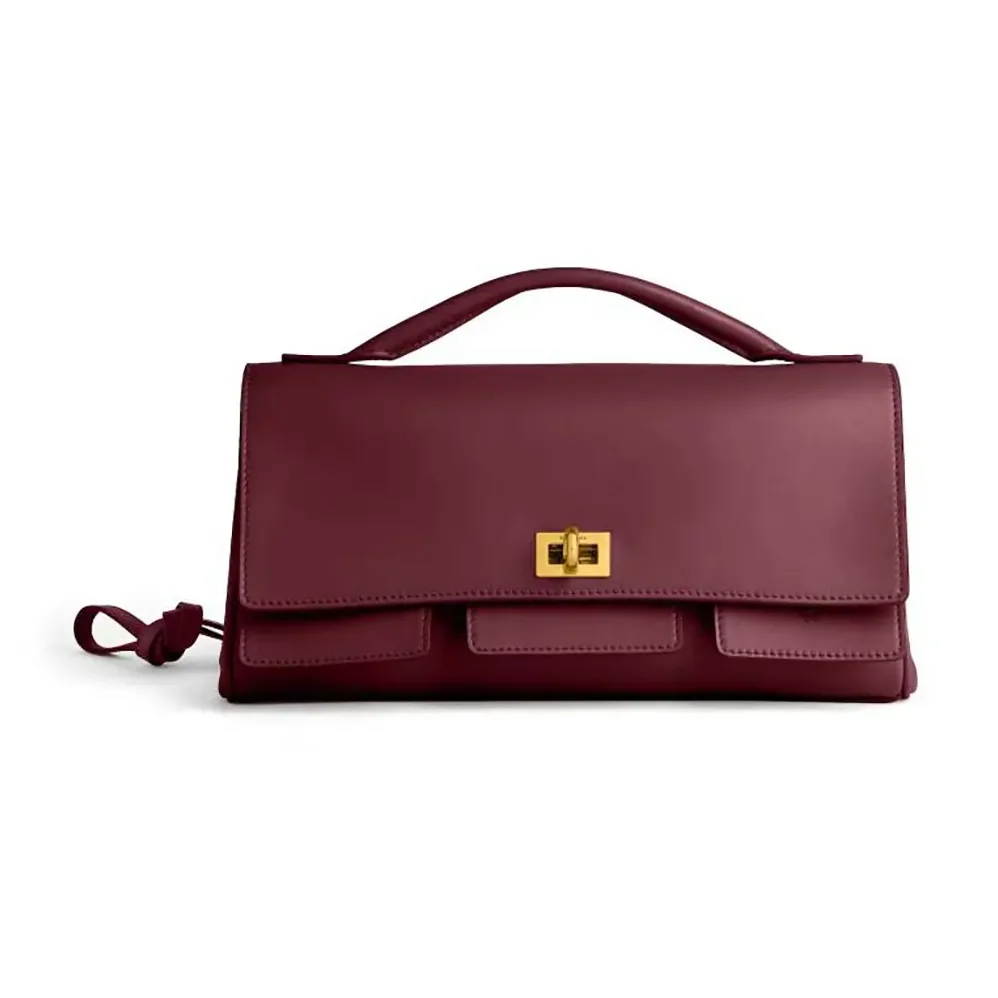 Balenciaga Bel Air Clutch On Strap Small in Dark Burgundy for Women Balenciaga Bel Air Clutch On Strap Small in Dark Burgundy for Women