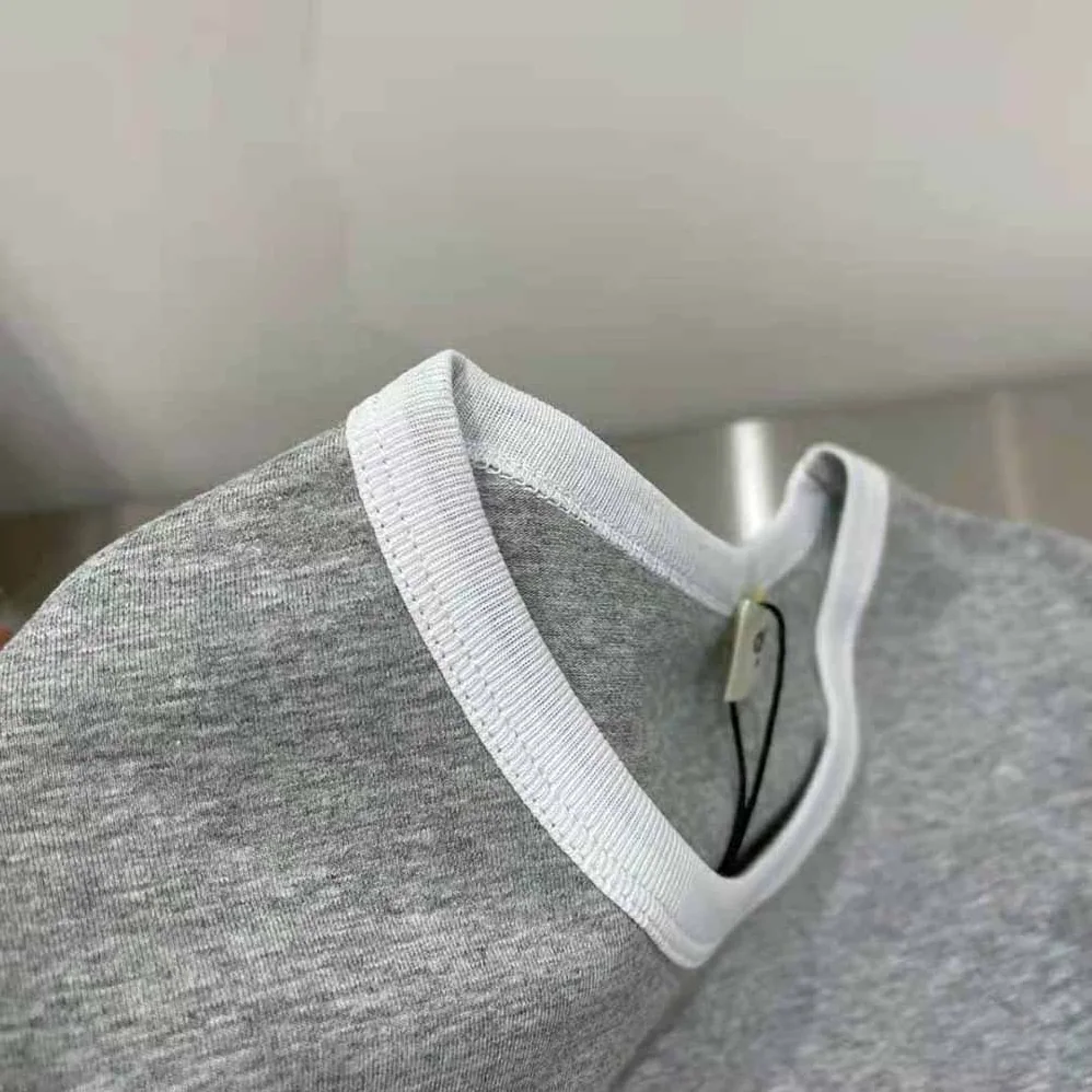 Celine Embroidered Celine 16 T-shirt in Cotton Jersey for Women in Silver Celine Embroidered Celine 16 T-shirt in Cotton Jersey for Women in Silver