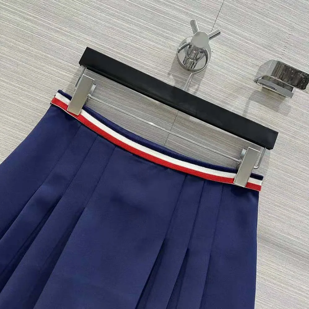 Celine Pleated Mini Skirt in Cotton Gabardine for Women in Navy Celine Pleated Mini Skirt in Cotton Gabardine for Women in Navy