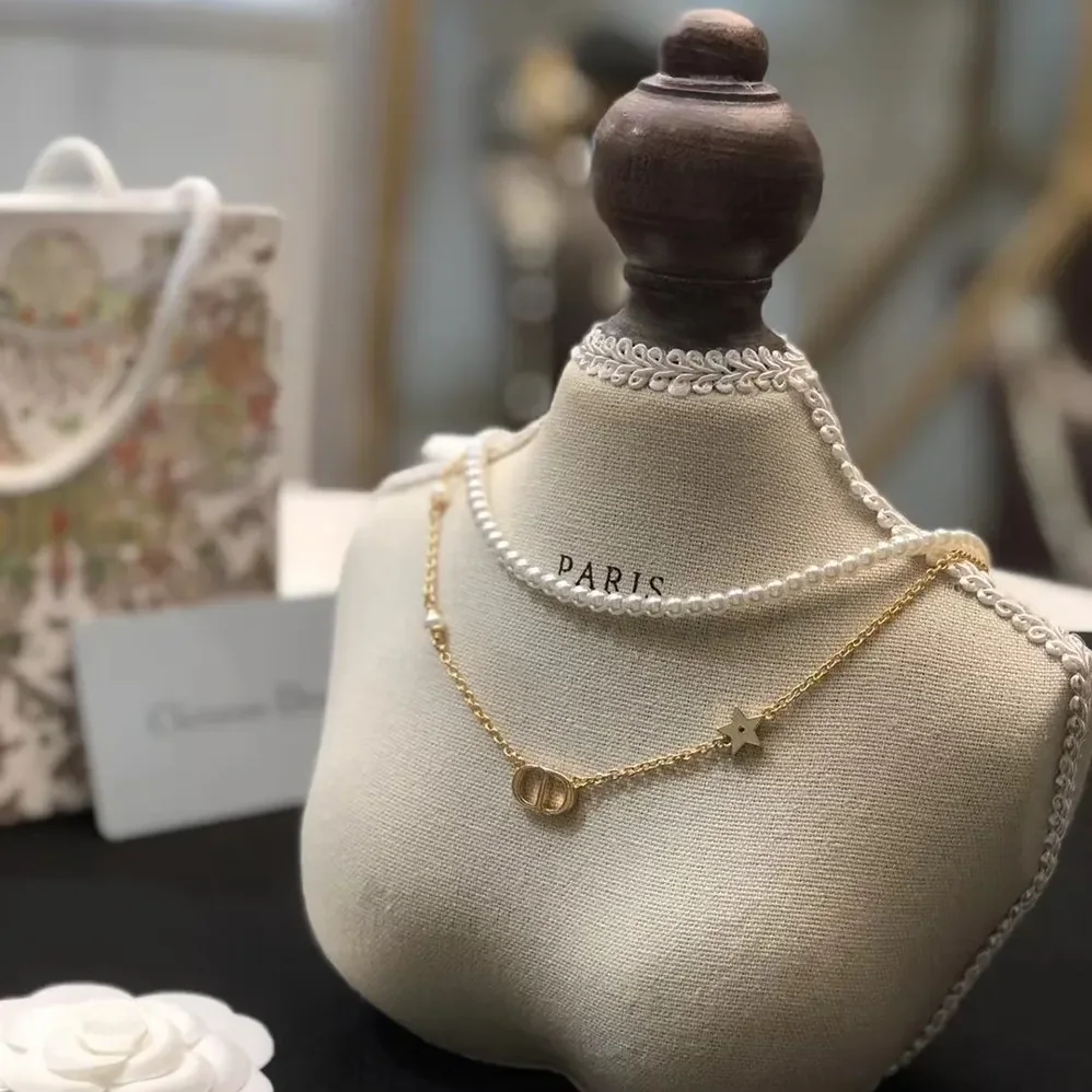 Dior Petit CD Necklace Gold-Finish Metal with White Resin Pearls and Silver for Women in Tone Crystals Dior Petit CD Necklace Gold-Finish Metal with White Resin Pearls and Silver for Women in Tone Crystals