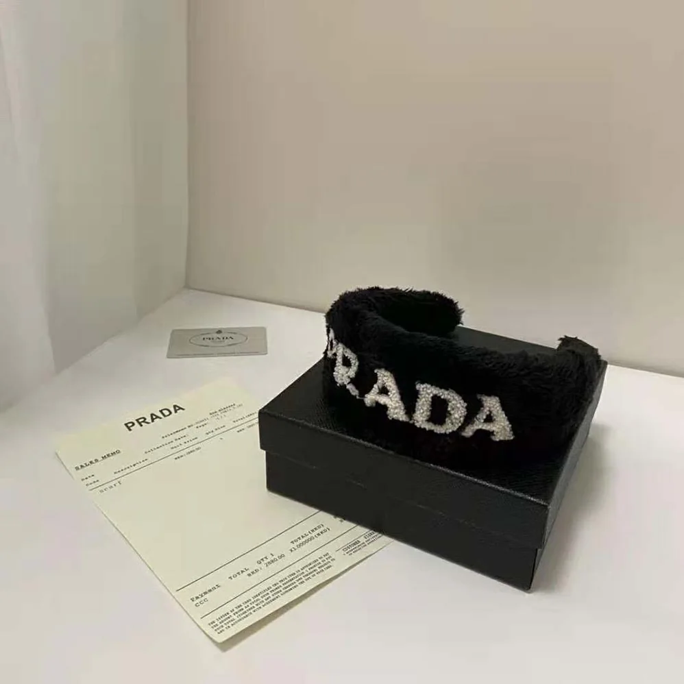 Prada Terrycloth Headband with A Beguiling Rounded Design for Women Prada Terrycloth Headband with A Beguiling Rounded Design for Women