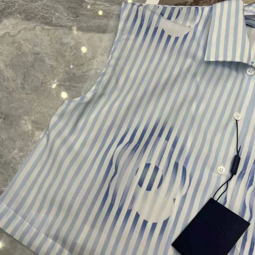 Prada Sleeveless Printed Poplin Shirt for Women in Blue Prada Sleeveless Printed Poplin Shirt for Women in Blue