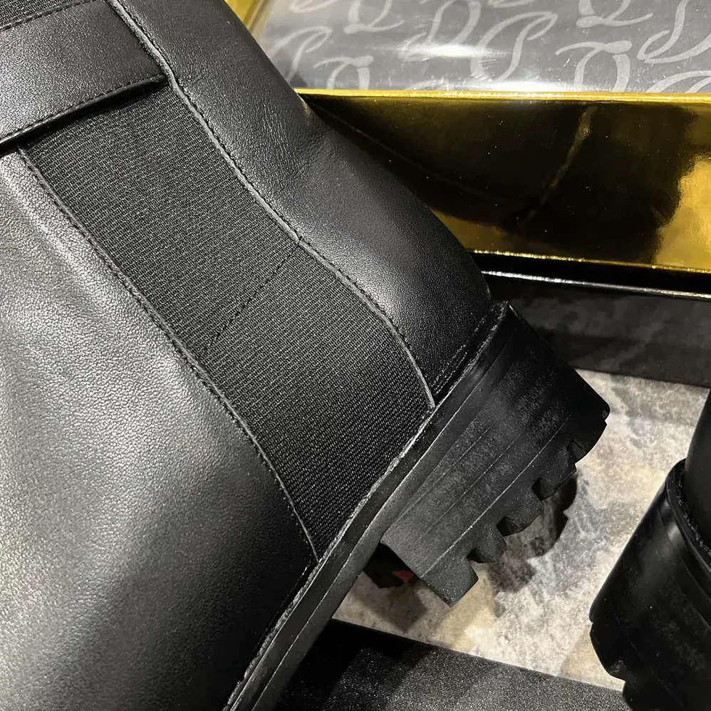 Christian Louboutin CL Chelsea Booty Lug Low Boots Calf Leather for Women in Black