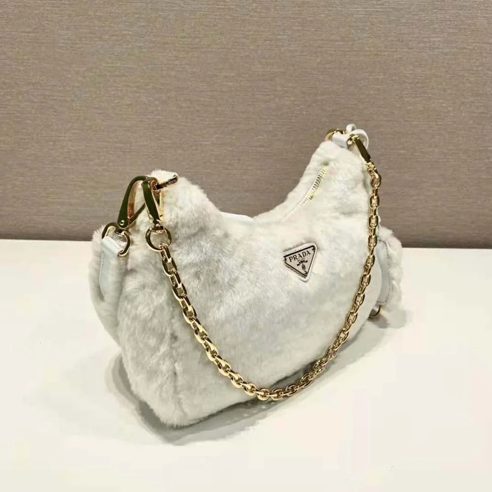 Prada Shearling Mini-Bag with the Enameled Metal Triangle Logo for Women in White Prada Shearling Mini-Bag with the Enameled Metal Triangle Logo for Women in White