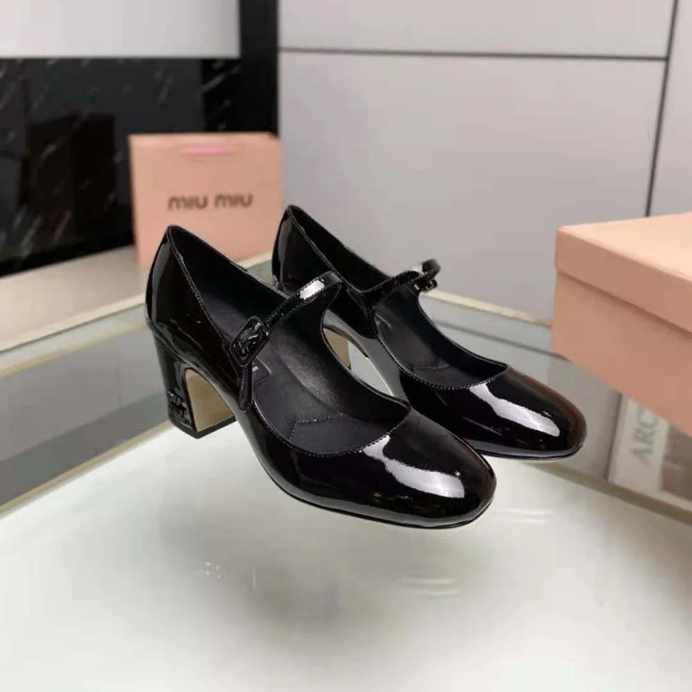 Miu Miu Patent Leather Pumps with Metal Lettering Logo for Women in Black Miu Miu Patent Leather Pumps with Metal Lettering Logo for Women in Black