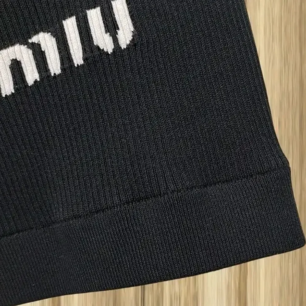 Miu Miu Viscose Top with Intarsia Logo Completes for Women in Black Miu Miu Viscose Top with Intarsia Logo Completes for Women in Black