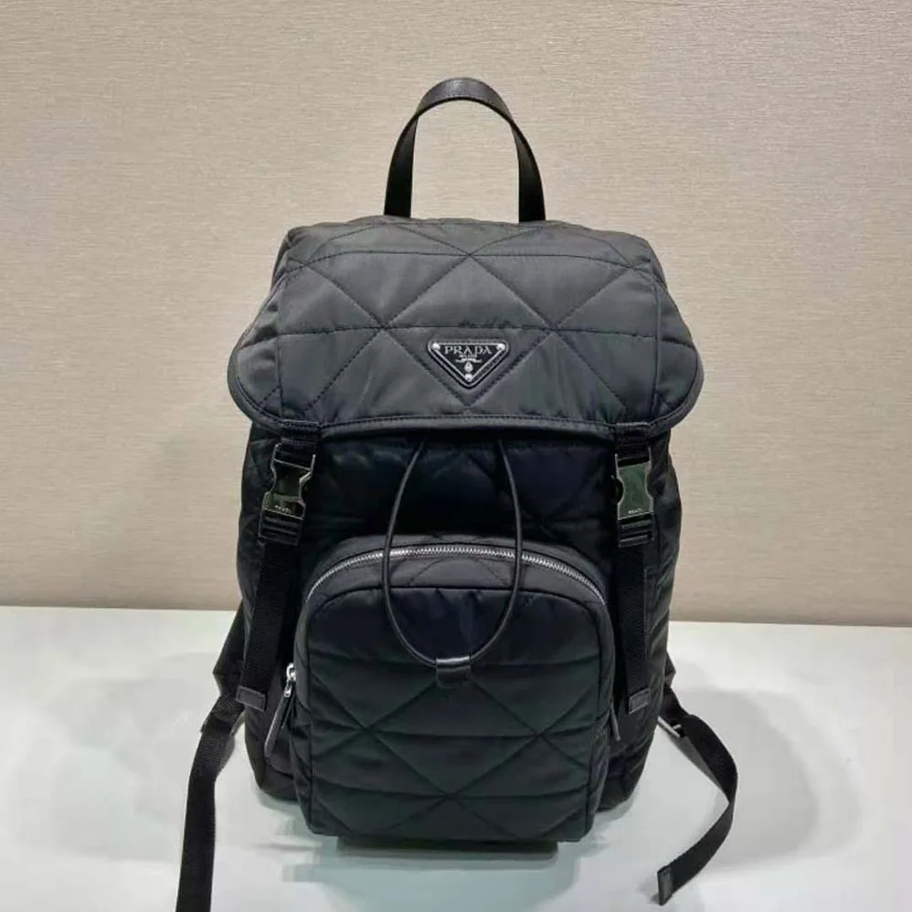 Prada Re-Nylon Backpack with Topstitching for Men in Black Prada Re-Nylon Backpack with Topstitching for Men in Black
