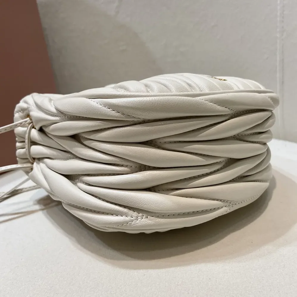 Miu Miu Matelassé Nappa Leather Pouch for Women in White Miu Miu Matelassé Nappa Leather Pouch for Women in White