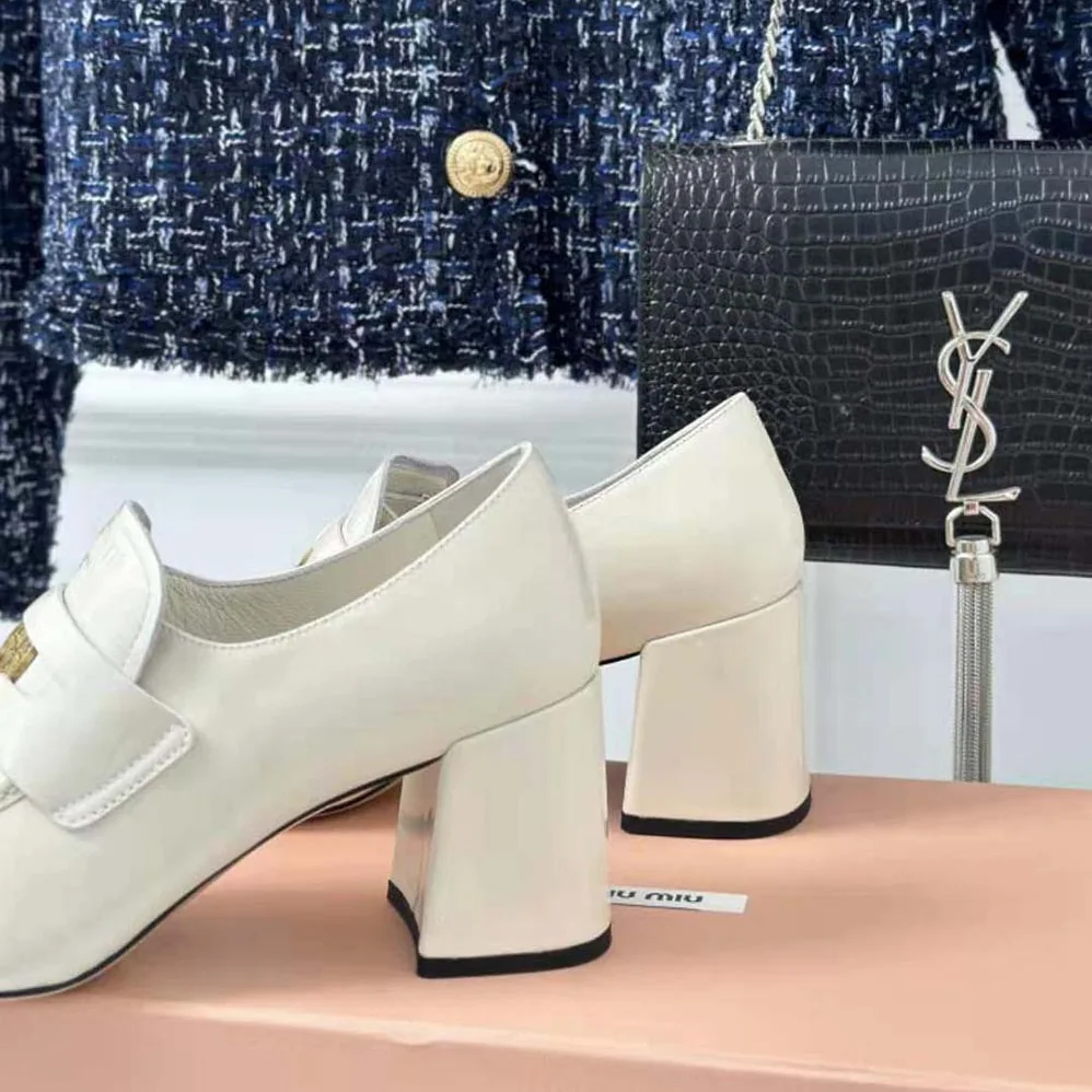 Miu Miu Patent Leather Loafers with Embossed Logo on the Tongue for Women in White Miu Miu Patent Leather Loafers with Embossed Logo on the Tongue for Women in White
