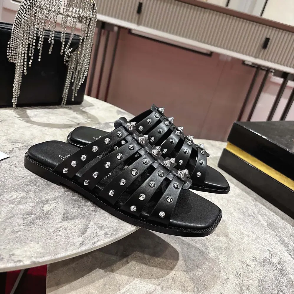 Christian Louboutin Charja Mules Waxed Calf Leather for Women in Black Christian Louboutin Charja Mules Waxed Calf Leather for Women in Black