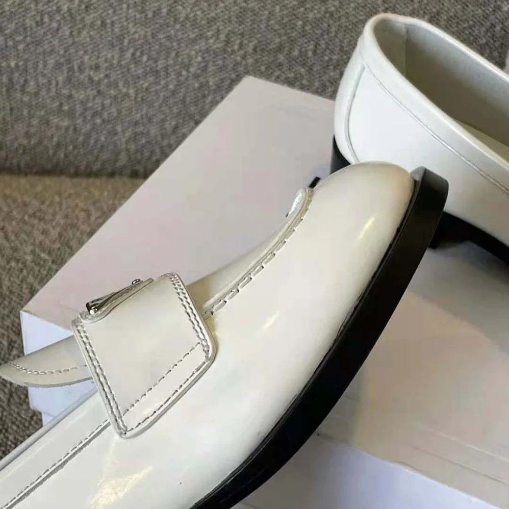 Prada Patent Leather Loafers in 25 mm Heel Height for Women in White Prada Patent Leather Loafers in 25 mm Heel Height for Women in White