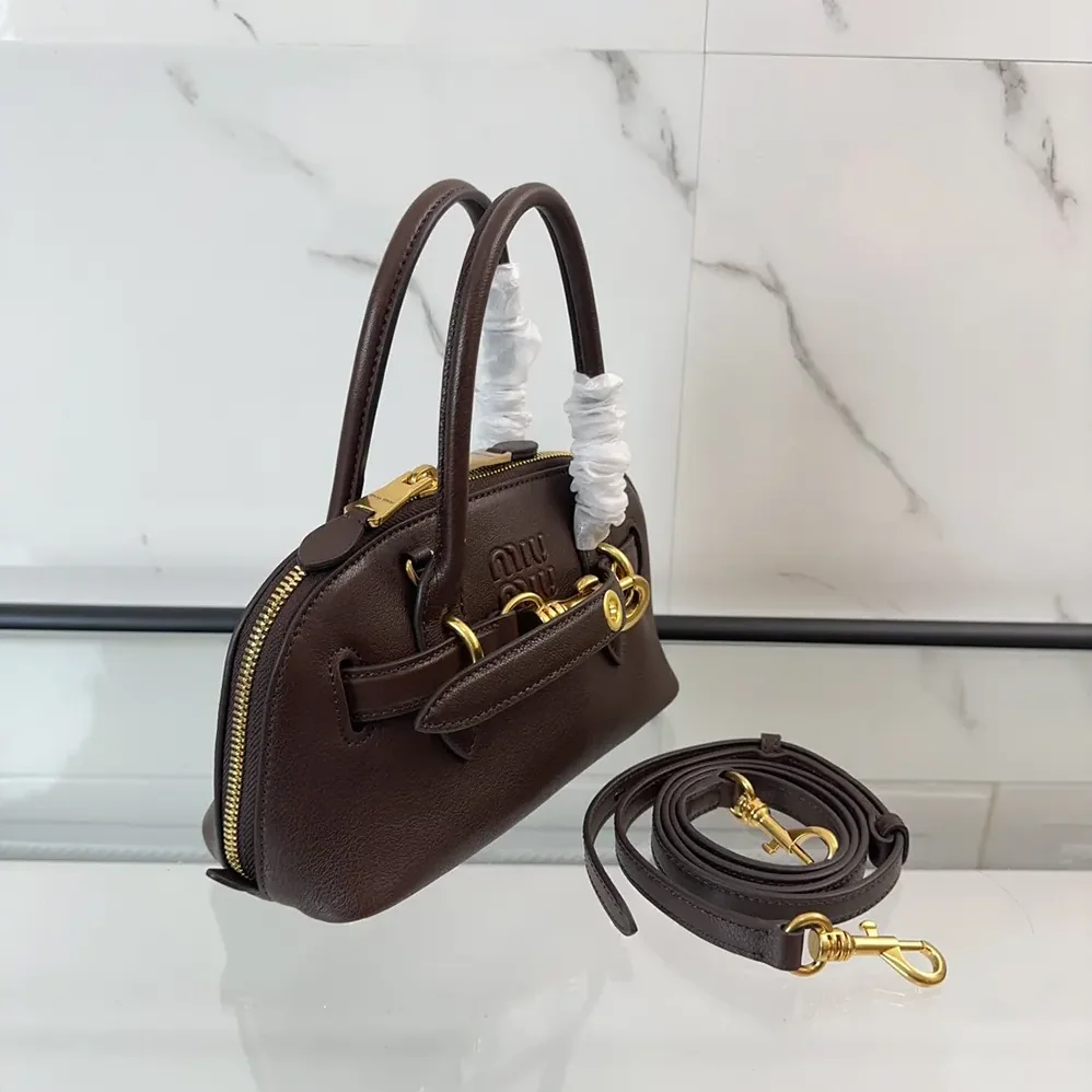 Miu Miu Aventure Nappa Leather Top-handle Bag for Women in Bordeaux Miu Miu Aventure Nappa Leather Top-handle Bag for Women in Bordeaux
