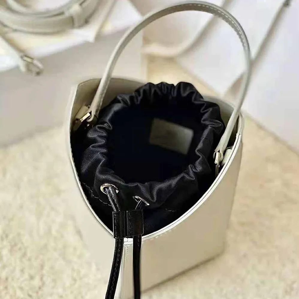 Givenchy Mini Cut Out Bucket Bag in Box Leather for Women in White Givenchy Mini Cut Out Bucket Bag in Box Leather for Women in White