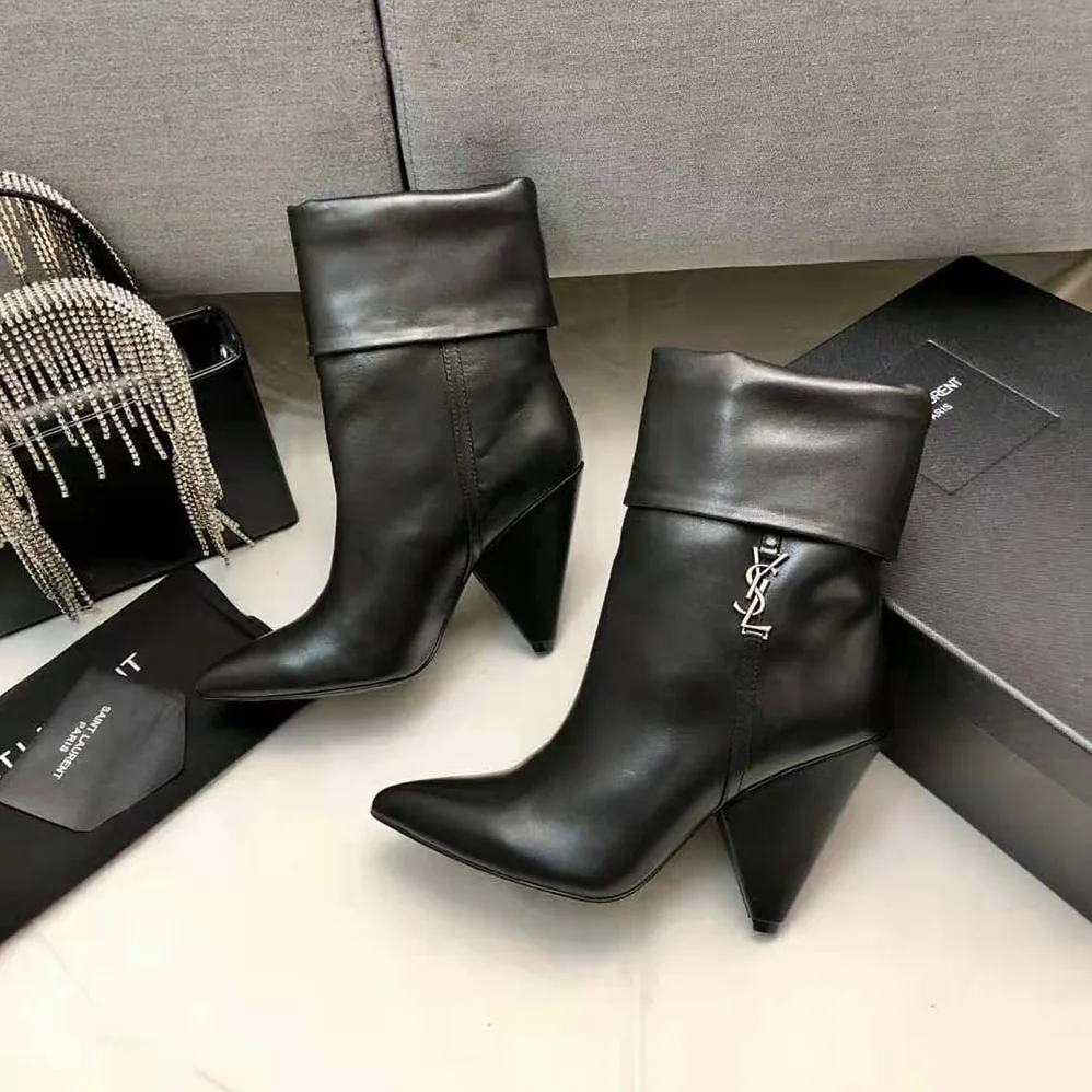 Saint Laurent YSL Niki Booties in Smooth Leather and Silver-Tone Monogram for Women in Black Saint Laurent YSL Niki Booties in Smooth Leather and Silver-Tone Monogram for Women in Black