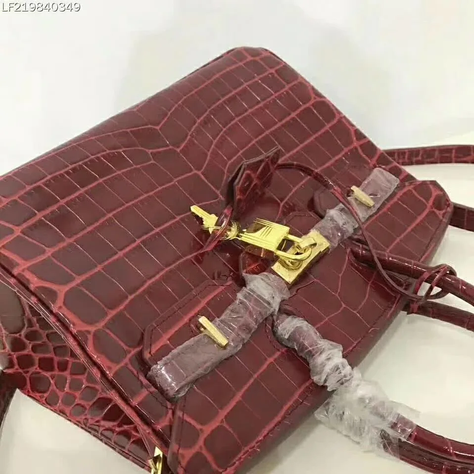 Hermes Birkin 30 Bag in Alligator Leather with Gold Hardware in Maroon Hermes Birkin 30 Bag in Alligator Leather with Gold Hardware in Maroon