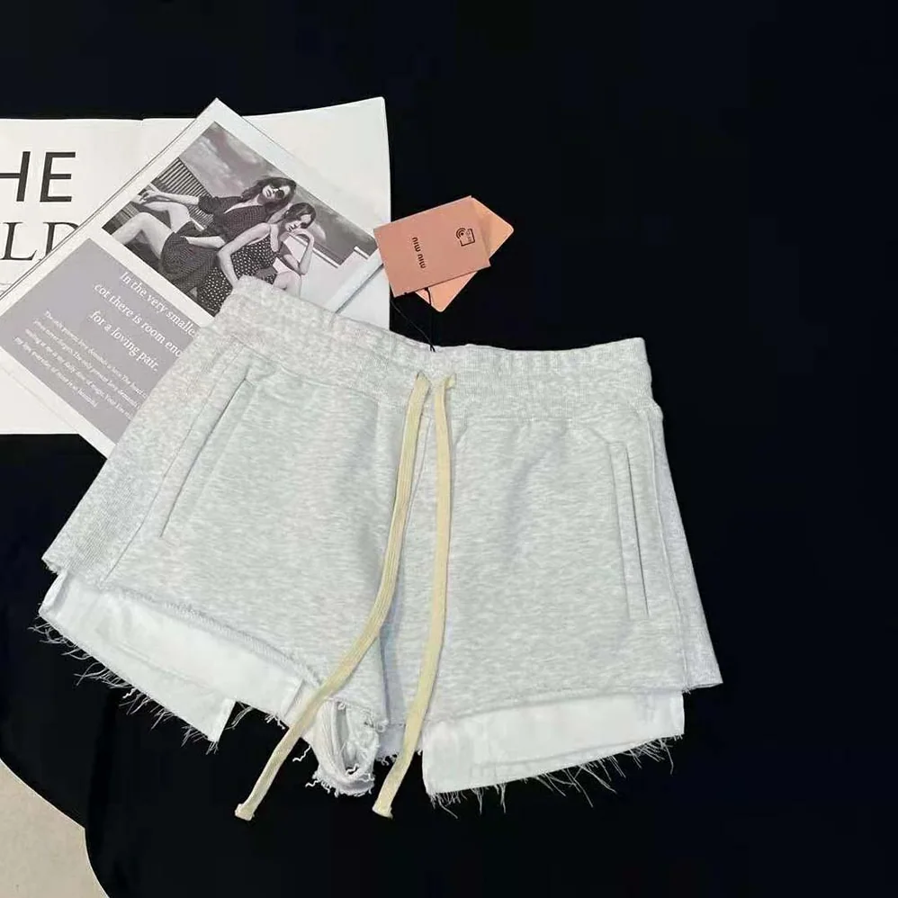 Miu Miu Embroidered Cotton Fleece Shorts for Women in Silver