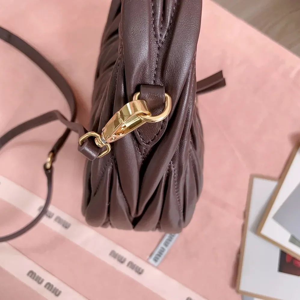Miu Miu Wander Matelassé Nappa Leather Hobo Mini-Bag for Women in Burgundy