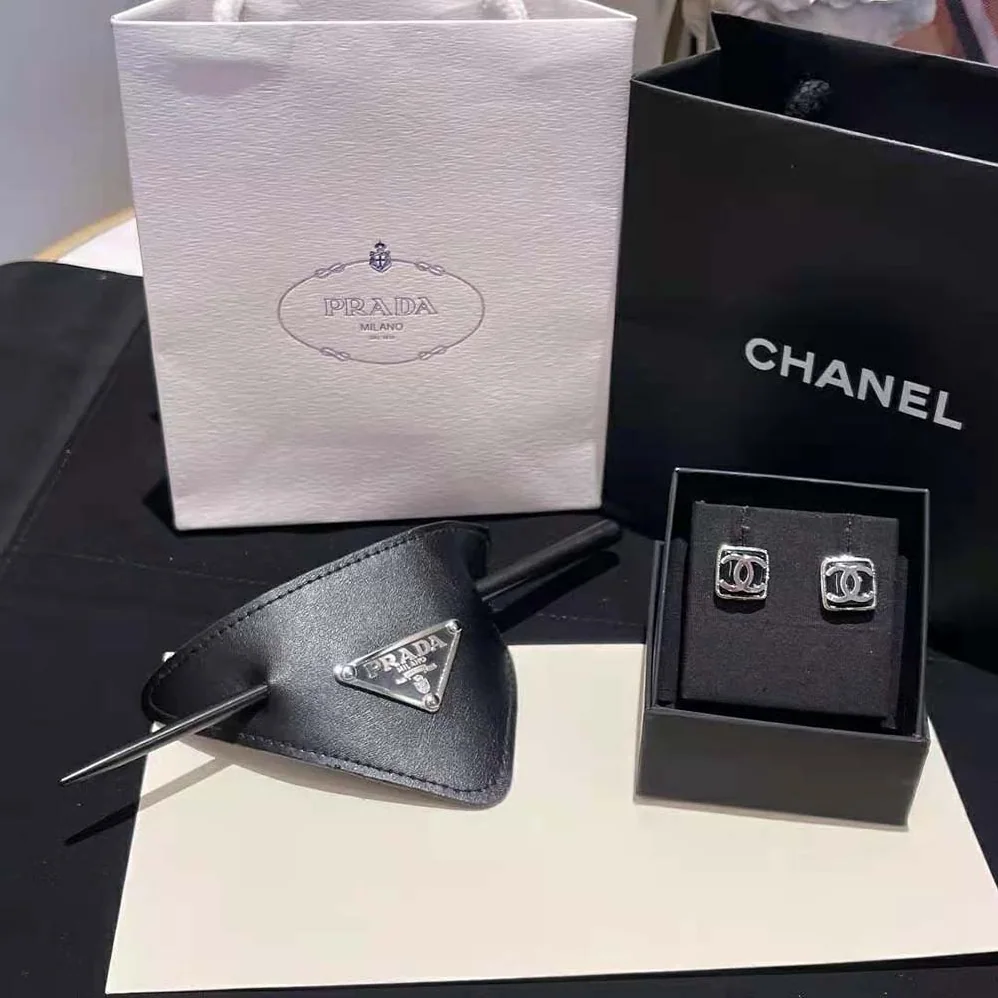 Prada Leather Hair Clip is Decorated with the Prada Logo for Women