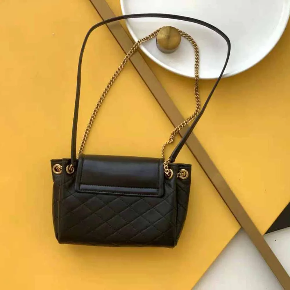 Saint Laurent YSL Mini Nolita in Lambskin for Women in Black Saint Laurent YSL Mini Nolita in Lambskin for Women in Black