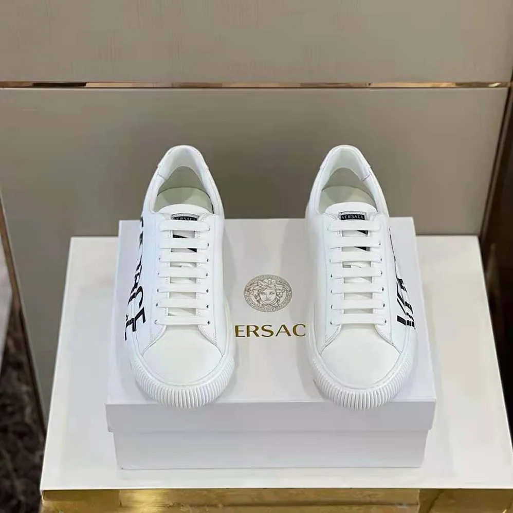 Versace Shoes Greca Logo Sneakers for Unisex in White Versace Shoes Greca Logo Sneakers for Unisex in White