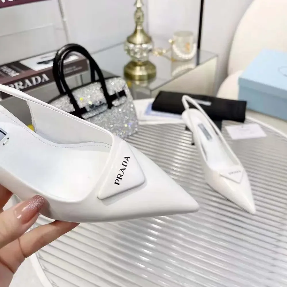 Prada Saffiano Patent Leather Slingback Pumps for Women in White Prada Saffiano Patent Leather Slingback Pumps for Women in White