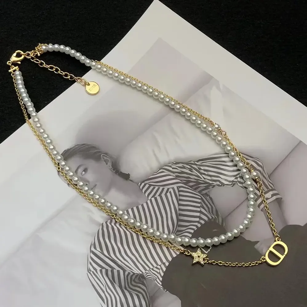 Dior Petit CD Necklace Gold-Finish Metal with White Resin Pearls and Silver for Women in Tone Crystals Dior Petit CD Necklace Gold-Finish Metal with White Resin Pearls and Silver for Women in Tone Crystals