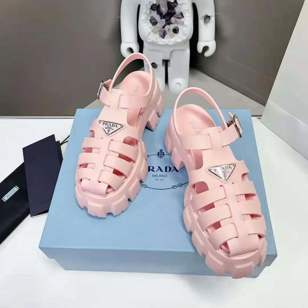 Prada Foam Rubber Sandals with Enameled Metal Triangle Logo for Women in Pink