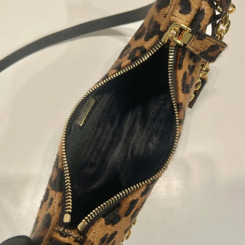 Prada Re-Edition Printed Leather Mini for Women in bag