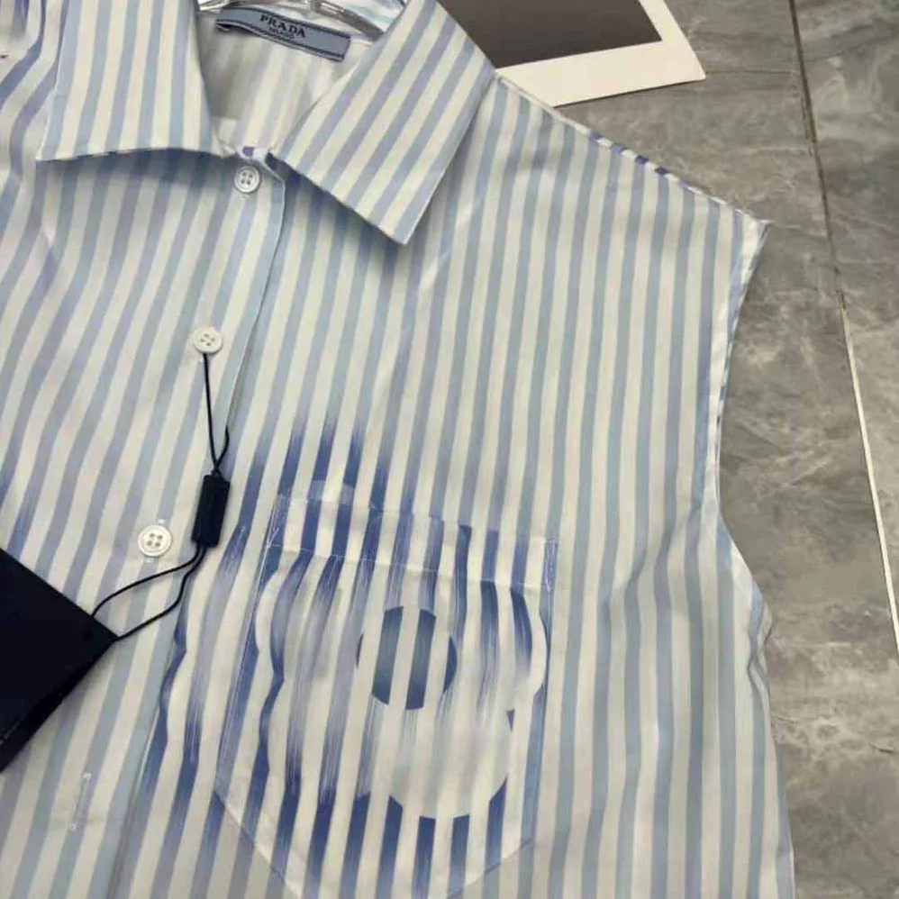 Prada Sleeveless Printed Poplin Shirt for Women in Blue Prada Sleeveless Printed Poplin Shirt for Women in Blue