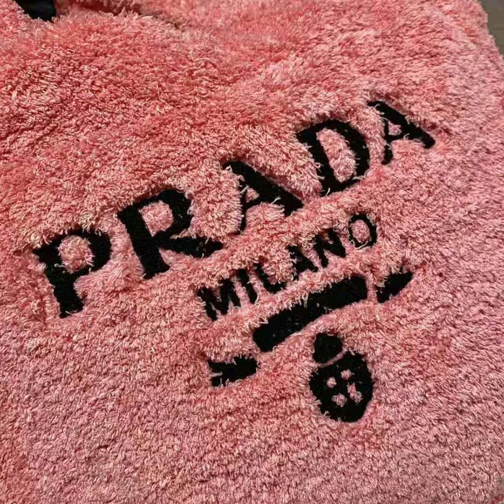 Prada Enameled Metal Triangle Logo Terry Tote Bag for Women in Pink Prada Enameled Metal Triangle Logo Terry Tote Bag for Women in Pink