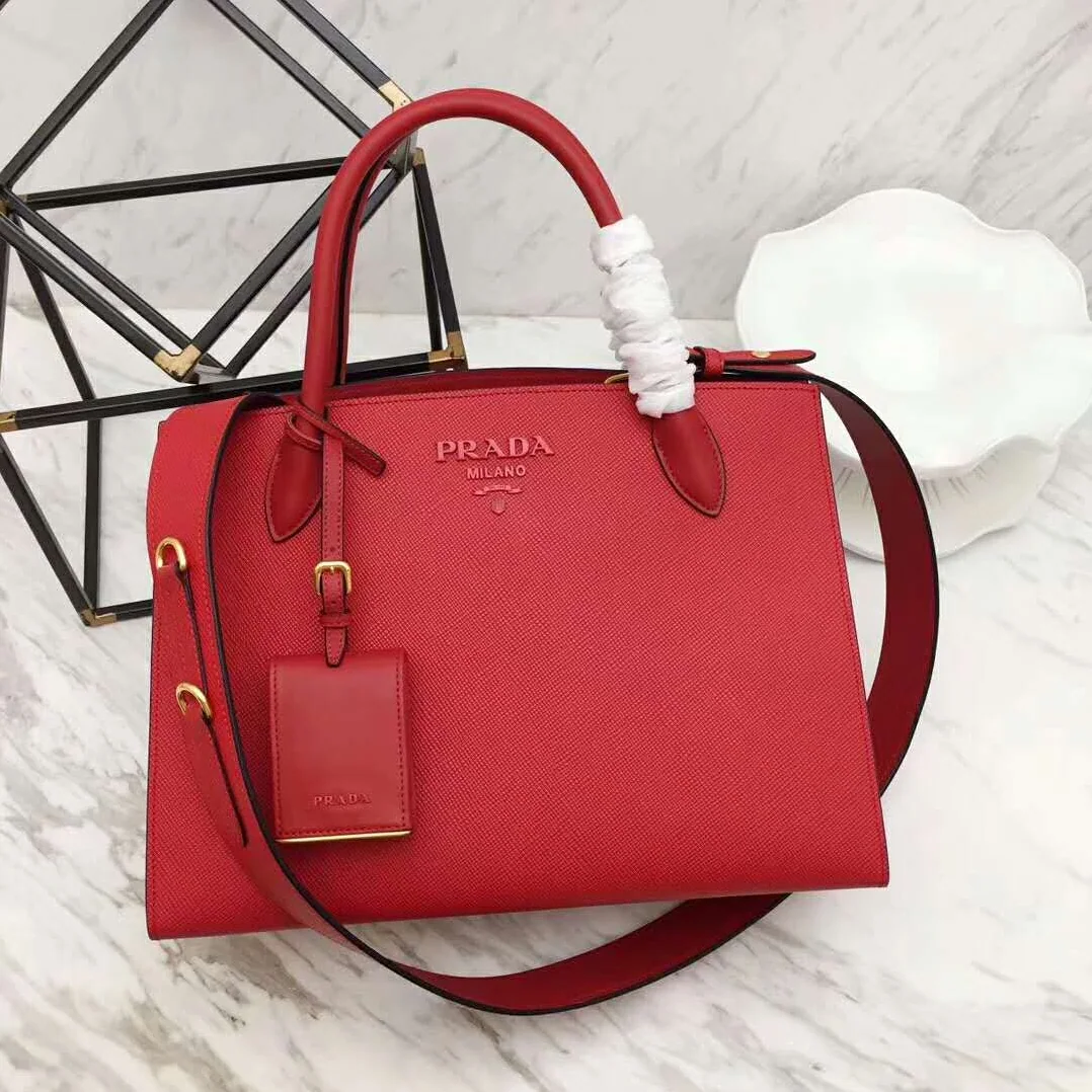Prada Monochrome Handbag in Saffiano and Calf Leather in Red Prada Monochrome Handbag in Saffiano and Calf Leather in Red