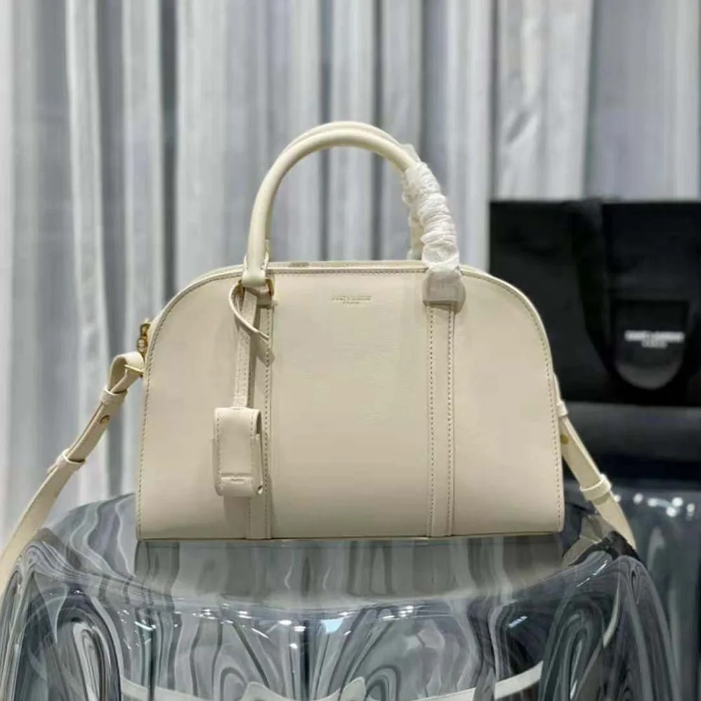 Saint Laurent YSL Lock Baby Duffle in Smooth Leather for Women in White Saint Laurent YSL Lock Baby Duffle in Smooth Leather for Women in White
