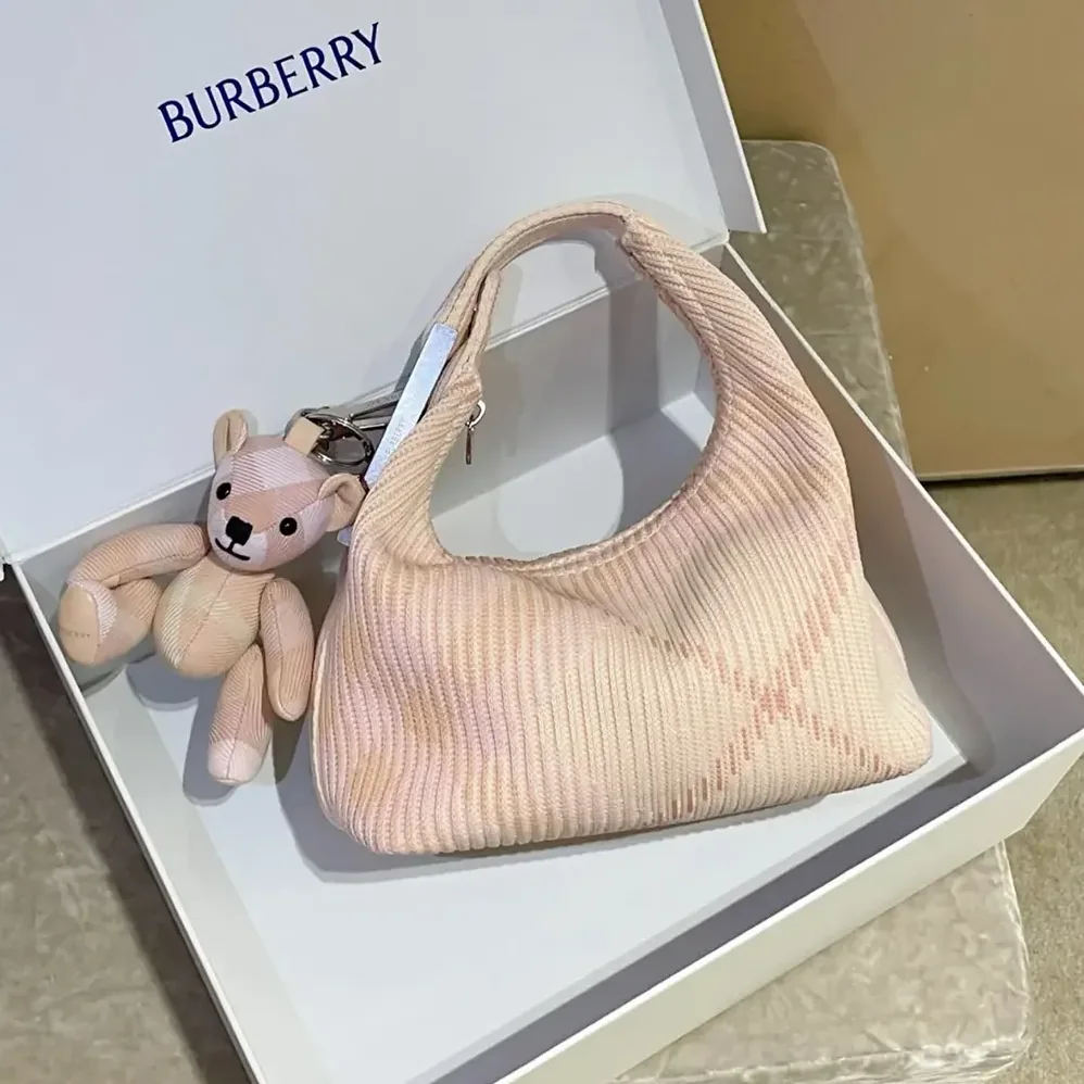 Burberry Mini Peg Duffle Bag for Women in Pink