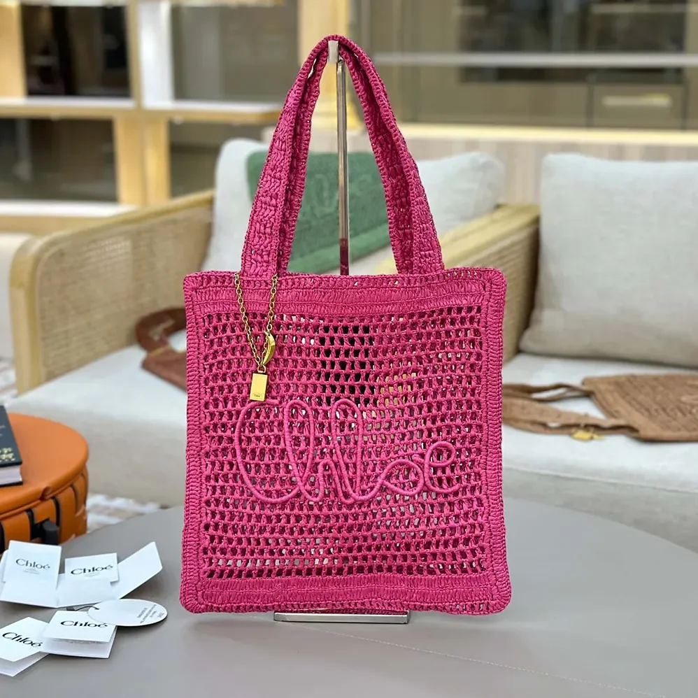 Chloe Summer Banana Tote Bag In Raffia for Women in Rose Chloe Summer Banana Tote Bag In Raffia for Women in Rose