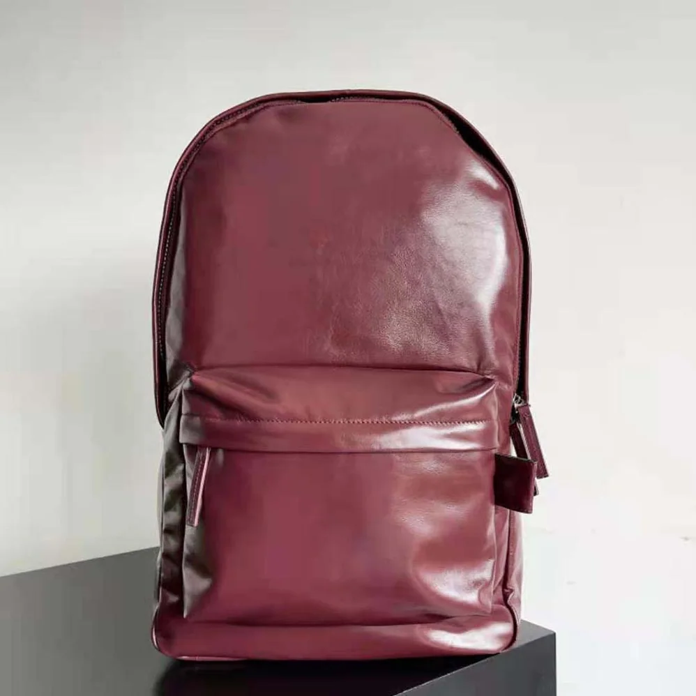 Bottega Veneta Medium Archetype Backpack Crafted from Supple Lambskin Leather for Men in Maroon