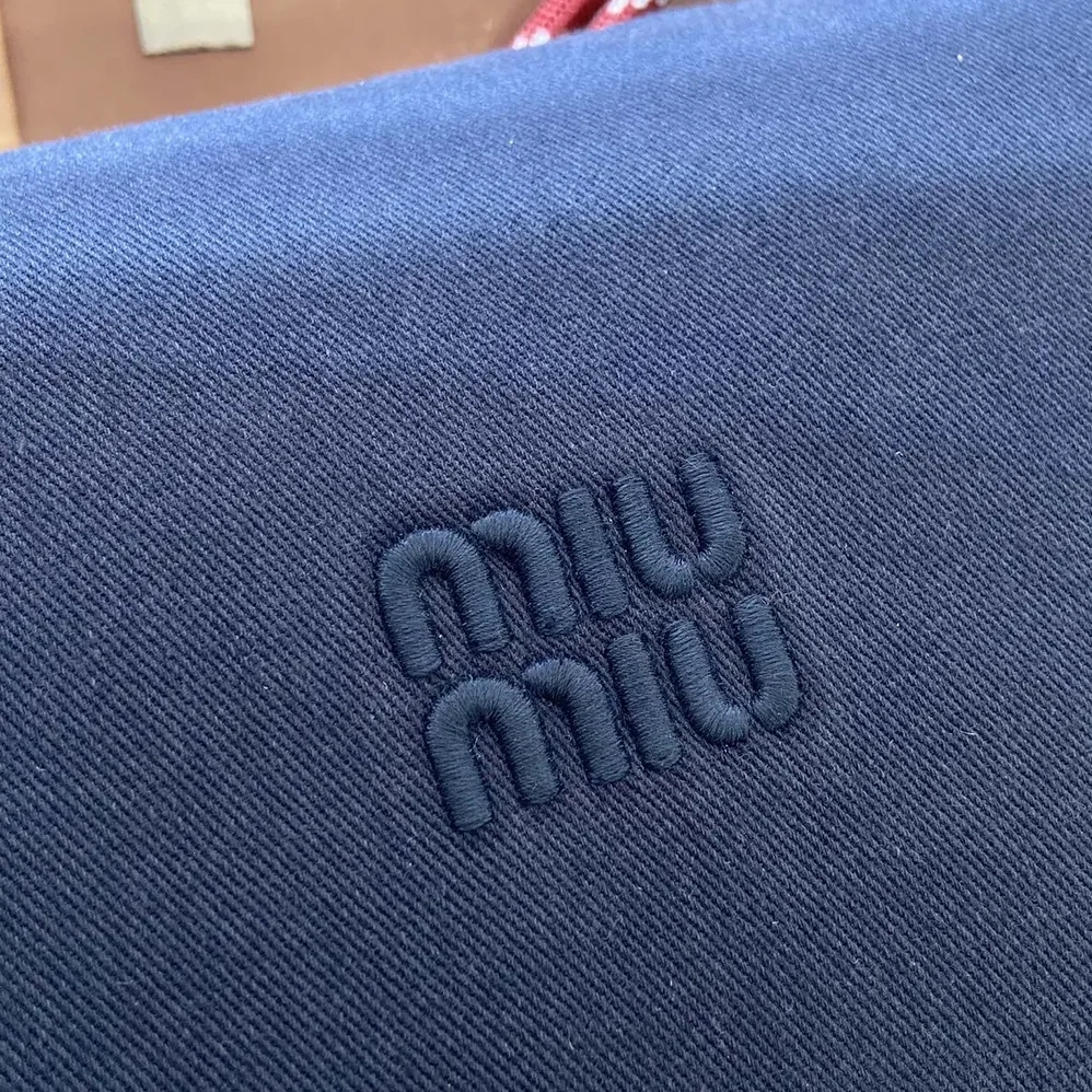Miu Miu Gabardine Pouch for Women in Navy Miu Miu Gabardine Pouch for Women in Navy