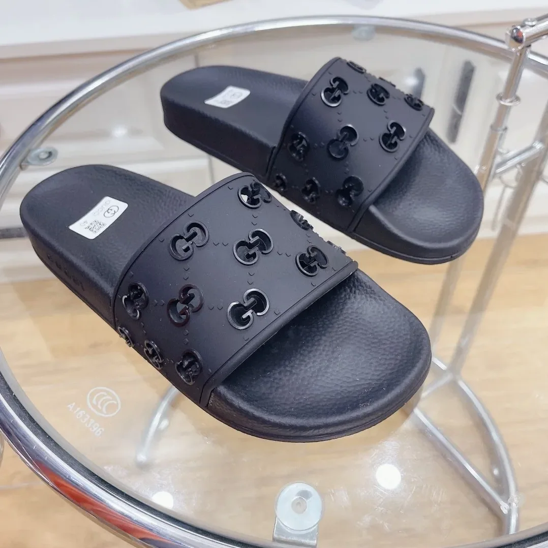 Gucci Rubber GG Slide Sandals Black for Women