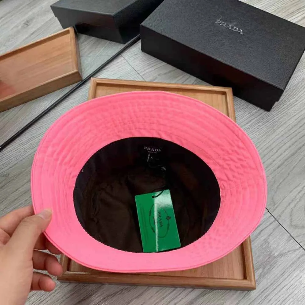 Prada Nylon Bucket Hat Decorated with the Triangle Logo for Women in Pink Prada Nylon Bucket Hat Decorated with the Triangle Logo for Women in Pink