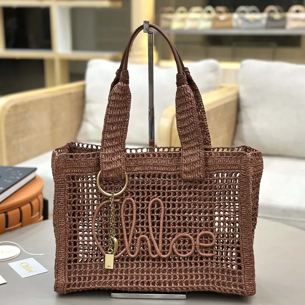 Chloe Summer Banana East-west Tote Bag in Raffia & Buffalo Leather for Women Chloe Summer Banana East-west Tote Bag in Raffia & Buffalo Leather for Women