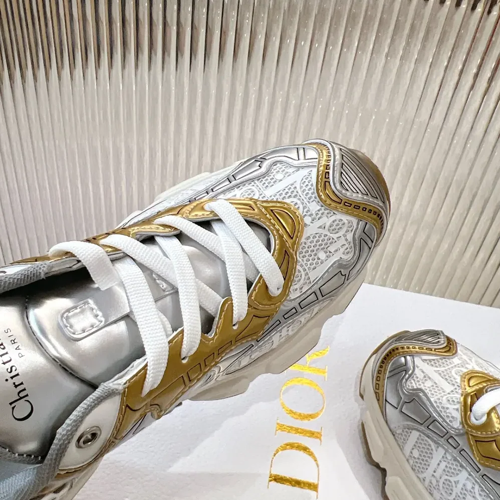 Dior Vibe Sneaker White Mesh Printed with Dior Oblique Motif and Gold- and Silver in Tone Dior Vibe Sneaker White Mesh Printed with Dior Oblique Motif and Gold- and Silver in Tone