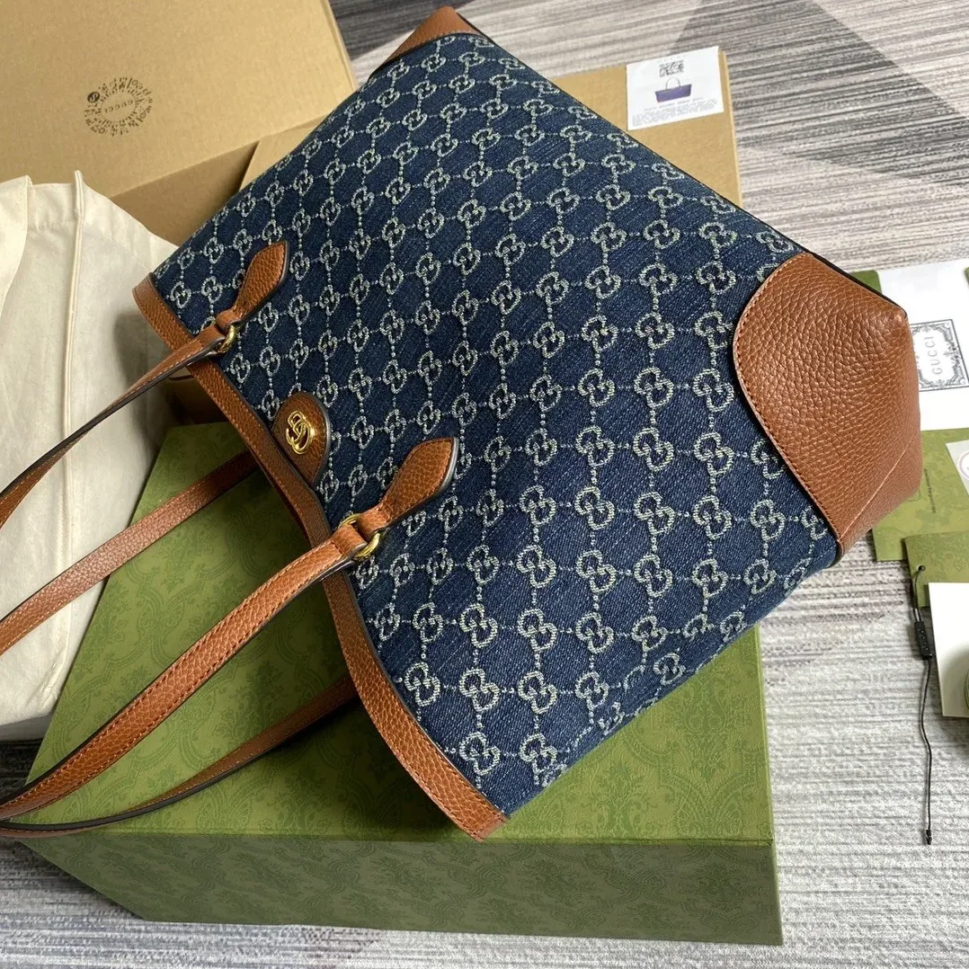 Gucci Ophidia GG Medium Tote Bag / Dark Blue/ Ivory Eco Washed Organic GG Jacquard Denim Gold Hardware Gucci Ophidia GG Medium Tote Bag / Dark Blue/ Ivory Eco Washed Organic GG Jacquard Denim Gold Hardware