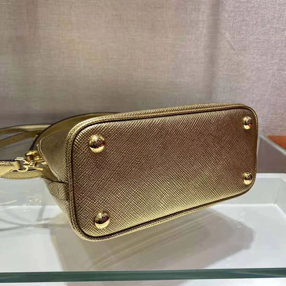 Prada Prada Matinee Micro Saffiano Leather Bag for Women in Gold Prada Prada Matinee Micro Saffiano Leather Bag for Women in Gold