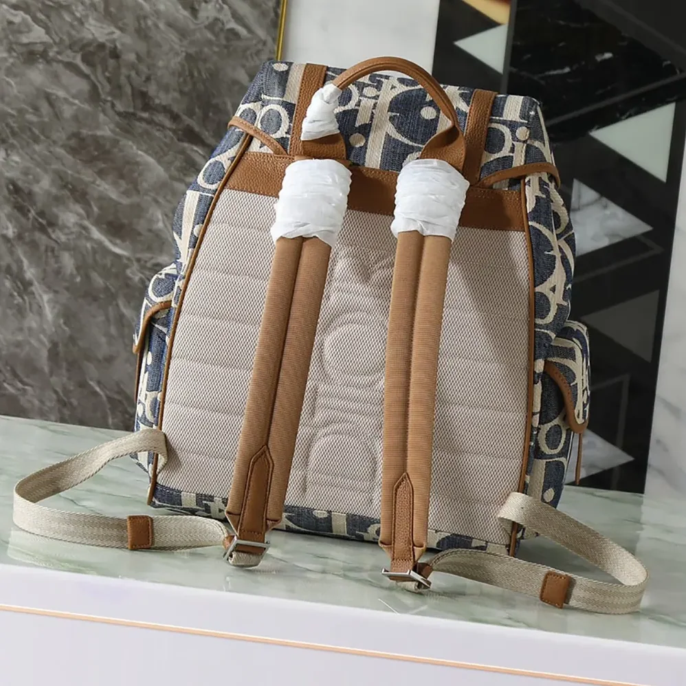 Dior Hit the Road Backpack with Flap Blue and Beige Raffia for Men in Effect Dior Oblique Denim Dior Hit the Road Backpack with Flap Blue and Beige Raffia for Men in Effect Dior Oblique Denim
