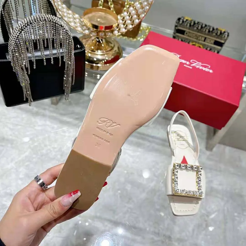 Roger Vivier Biki Love Strass Buckle Sandals in Leather for Women in White