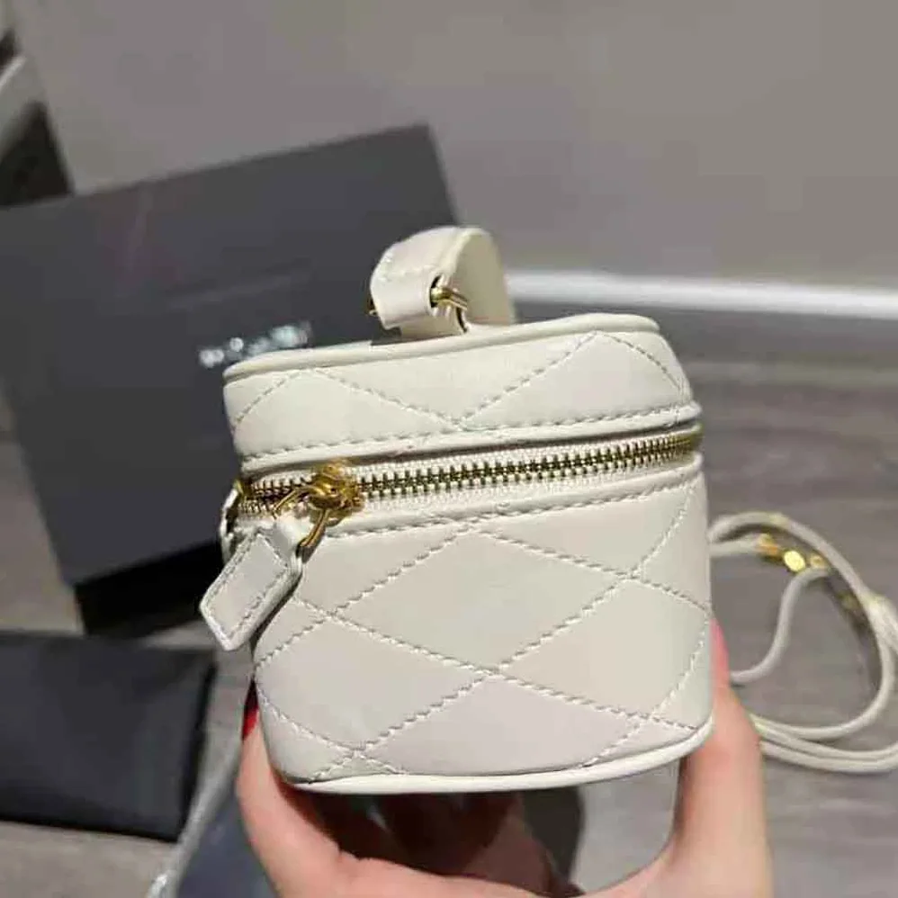 Saint Laurent YSL Mini Saint Laurent Vanity Case in Quilted Lambskin for Women in White Saint Laurent YSL Mini Saint Laurent Vanity Case in Quilted Lambskin for Women in White