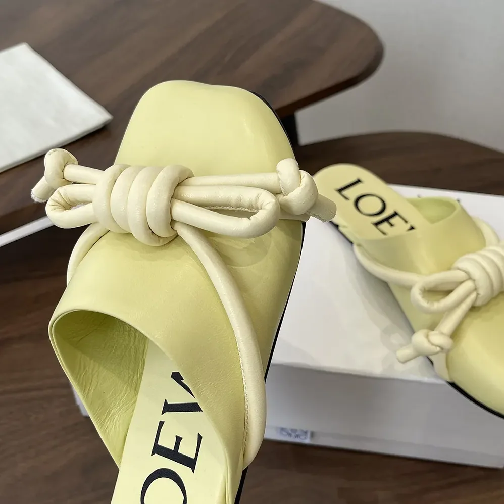 Loewe Flamenco Knot Mule in Lambskin for Women in Yellow Loewe Flamenco Knot Mule in Lambskin for Women in Yellow