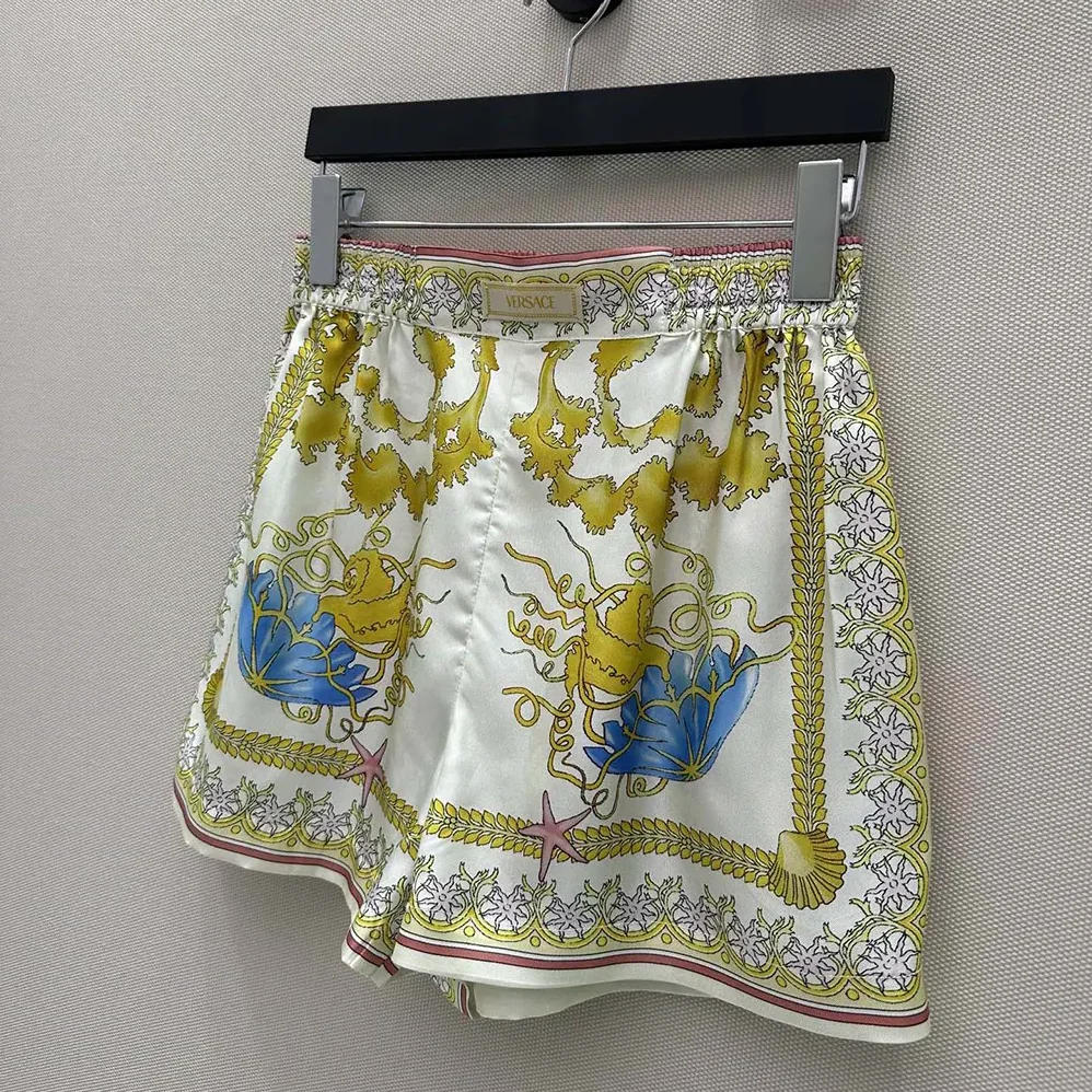 Versace Underwater Barocco Silk Shorts for Women in Yellow Versace Underwater Barocco Silk Shorts for Women in Yellow