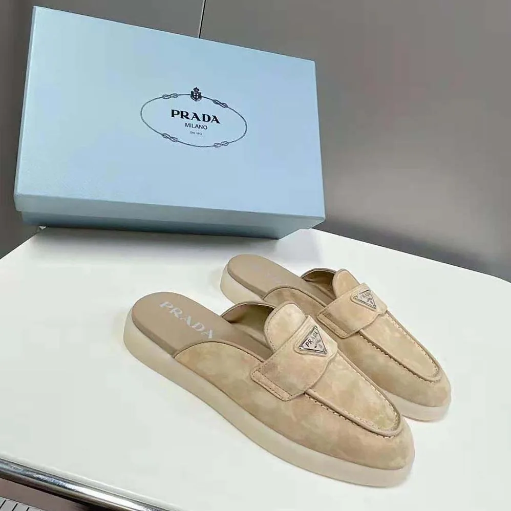 Prada Suede Leather Sabots with Enameled Metal Triangle Logo for Unisex in Brown